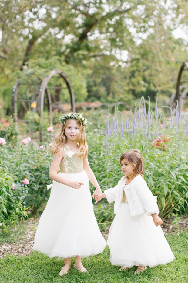 flower girls in white and gold