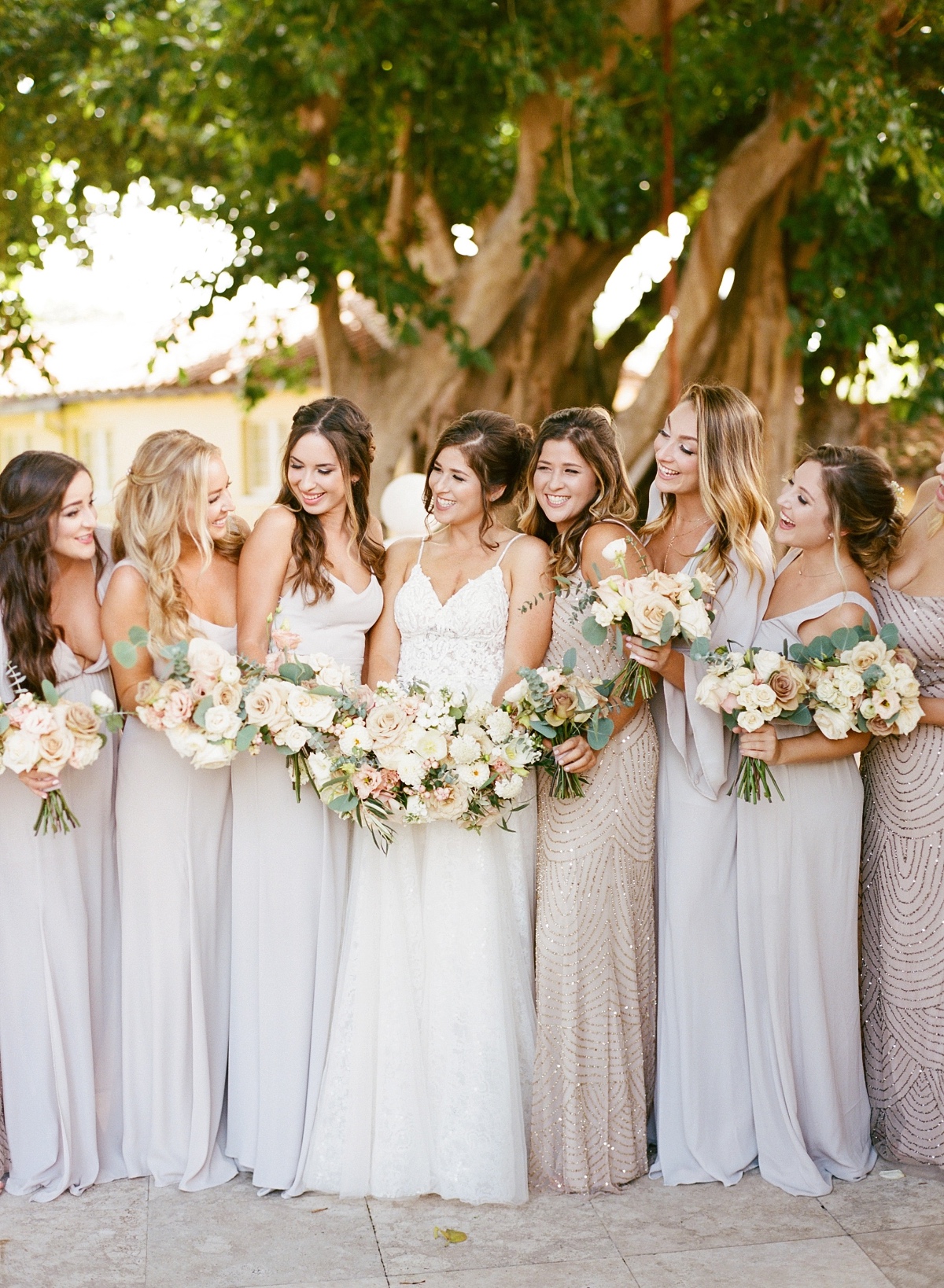 bridesmaids in soft grey and champagne