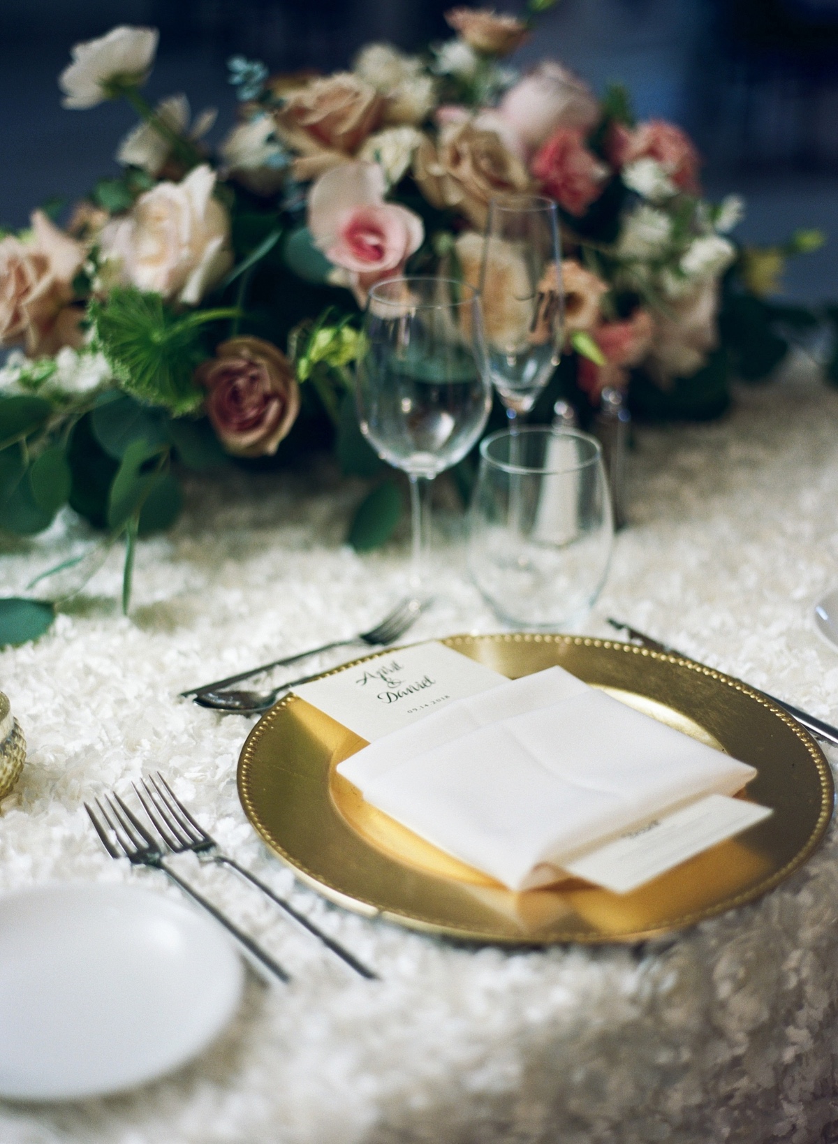 gold and white wedding place setting