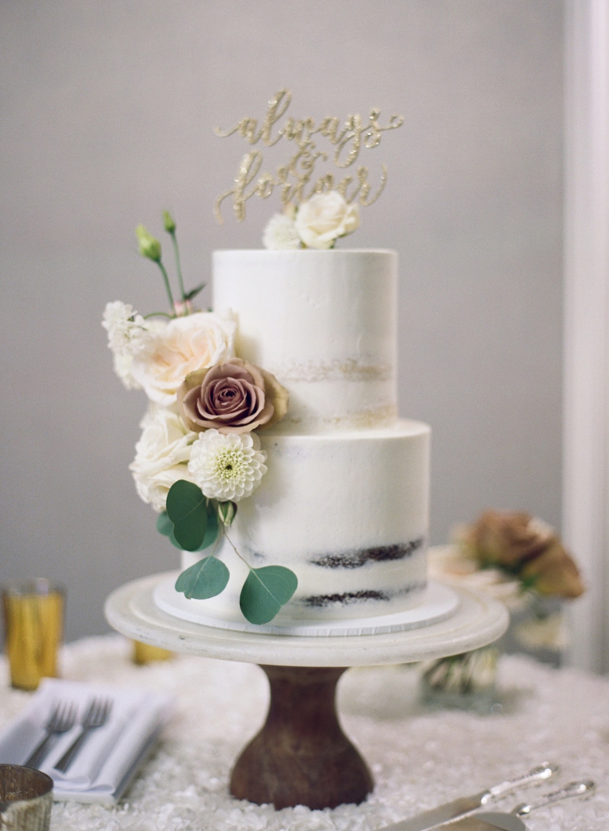 modern flower accented wedding cake