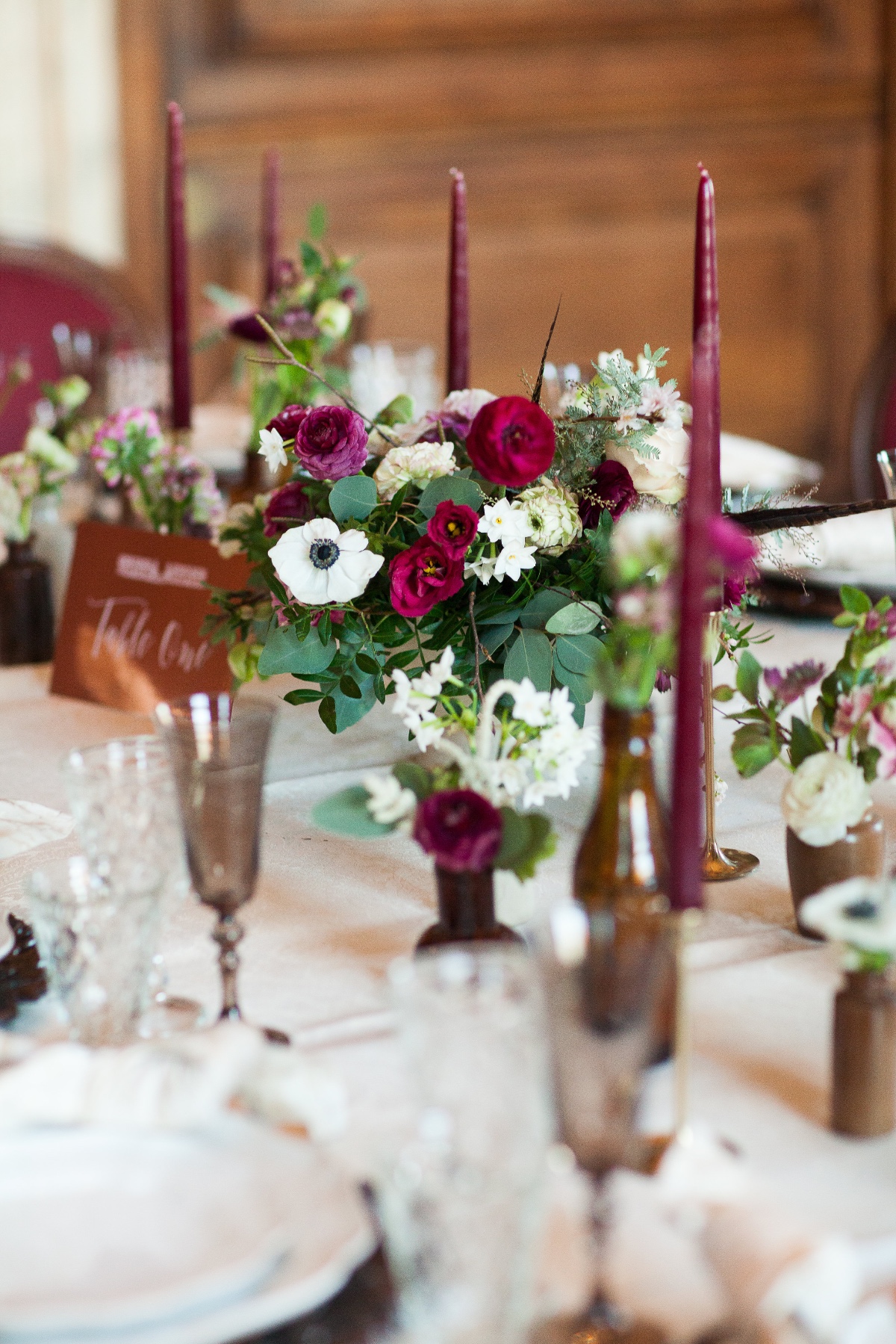 Elegant burgundy and white wedding table centerpiece