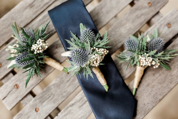 boutonnieres with blue thistle