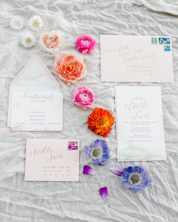 Elegant wedding stationery suite with colorful floral accents