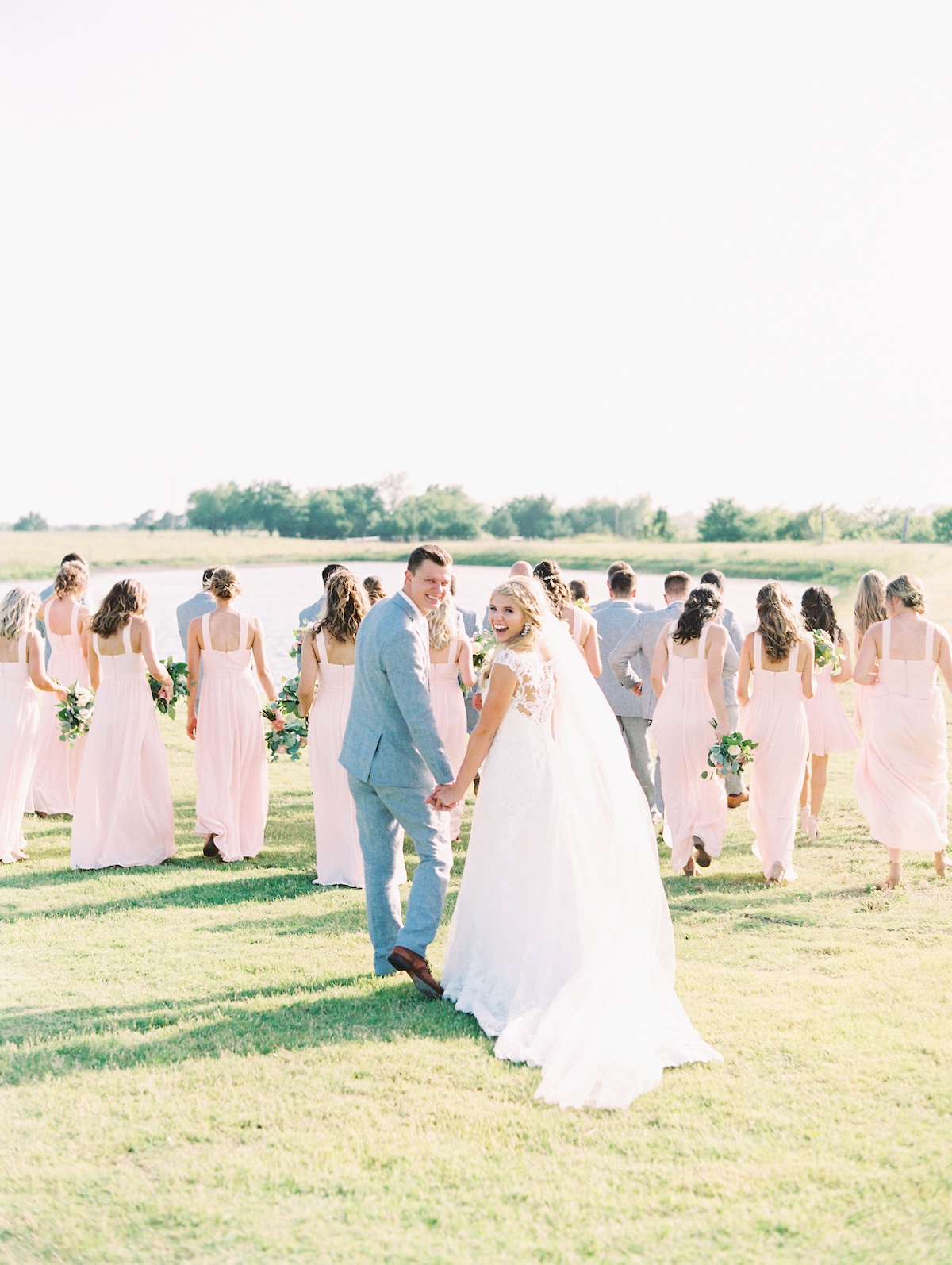 a wedding party in soft grey and blush