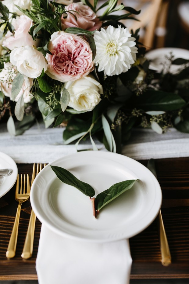 Elegant wedding table setting with floral centerpiece