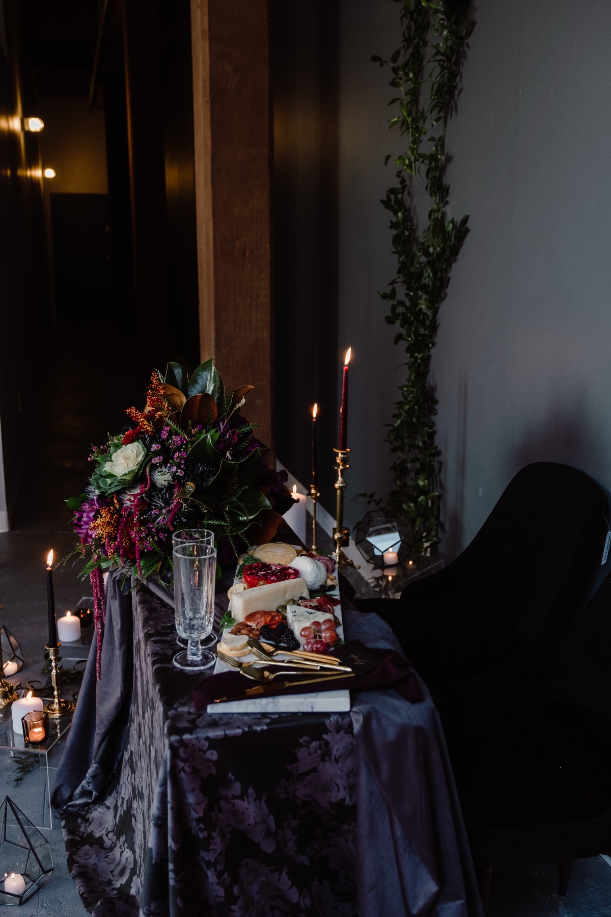dark and moody wedding sweetheart table