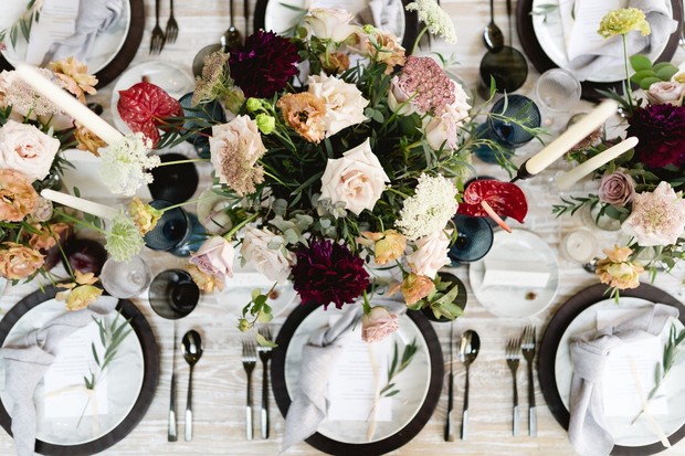 Elegant table setting with floral centerpiece and candles