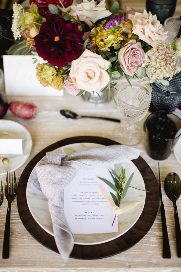 Elegant wedding table setting with floral centerpiece