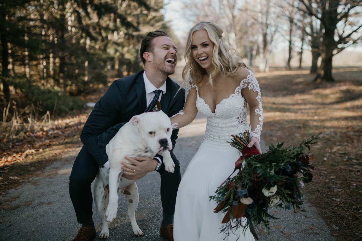 bride and groom and their pup