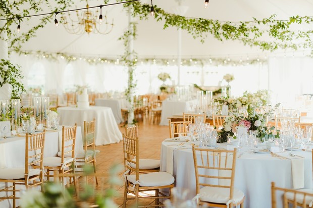 chic white and gold tented wedding venue