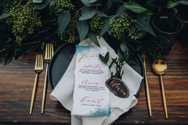 wedding place setting with modern gold flatware