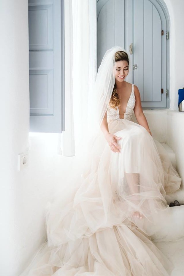 bride in blush Allure wedding dress