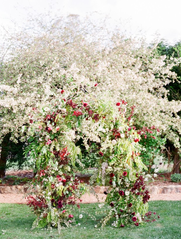 Wild floral wedding arbor
