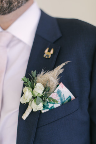 groom boutonniere and French Bulldog pin