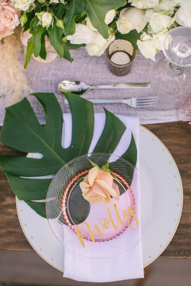 tropical themed wedding place setting
