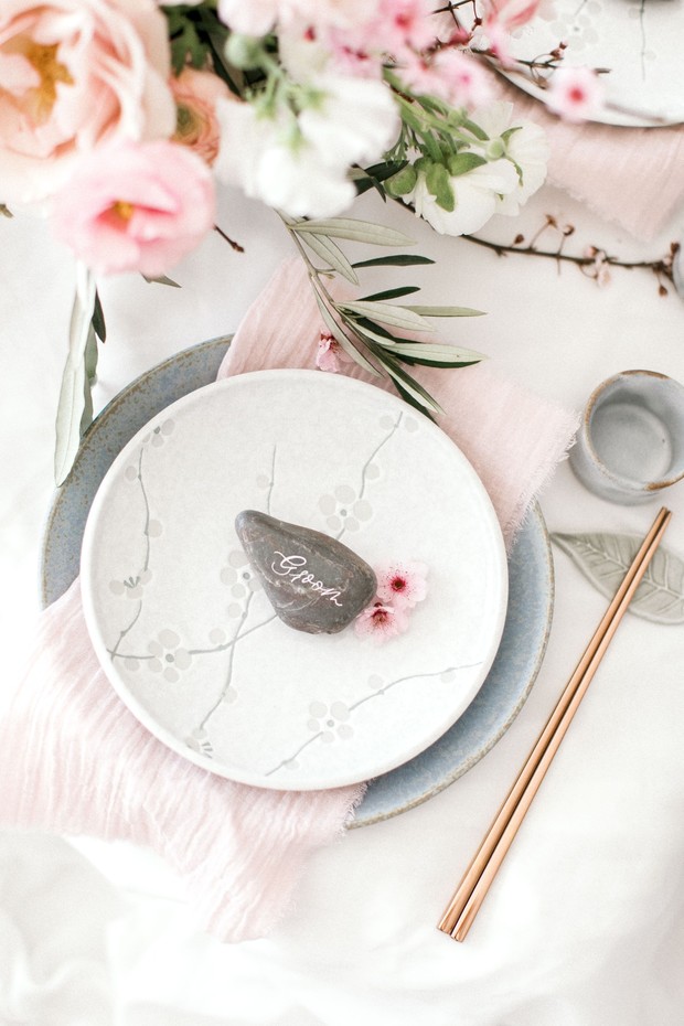 Beautiful cherry blossom table setting for a romantic wedding