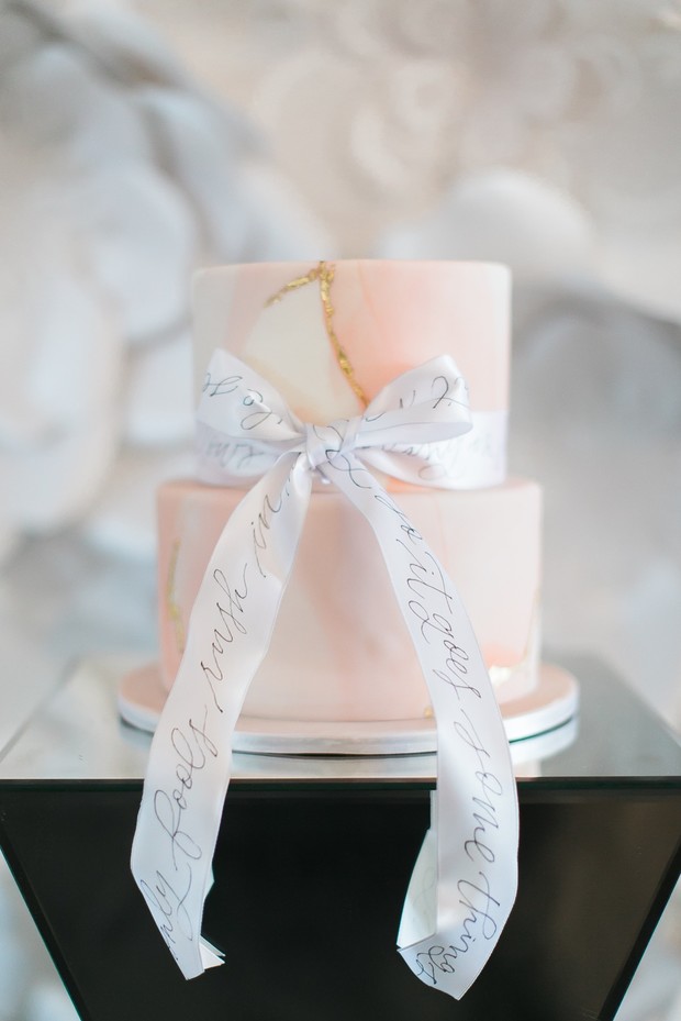 blush and gold marbled wedding cake