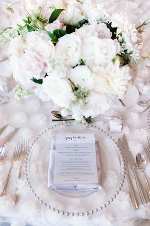 white and silver wedding place setting