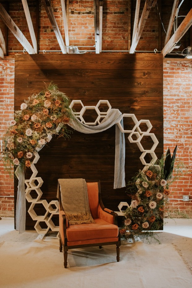 modern and romantic floral wedding ceremony backdrop
