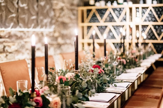 Romantic and elegant reception with black candles