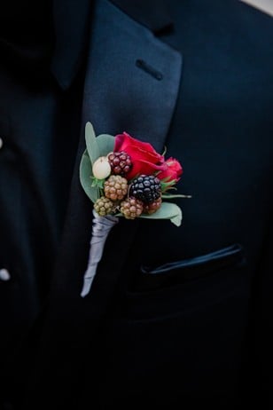 berry and rose boutonniere