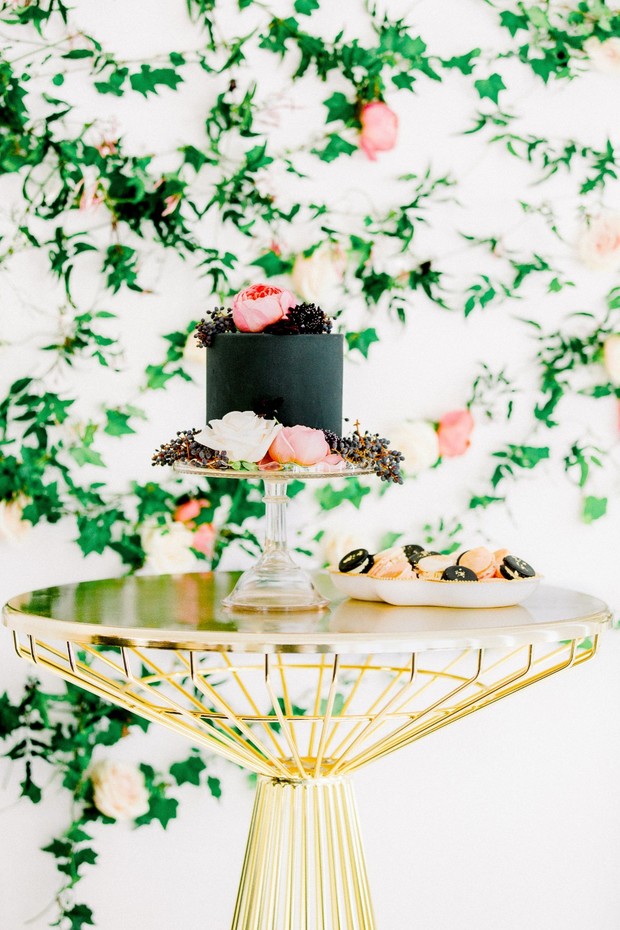 gold and black wedding cake table