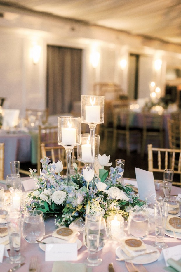 Elegant wedding table with candles and floral centerpiece