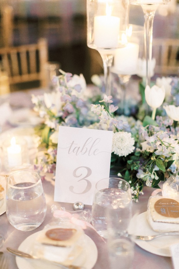 Elegant wedding table setting with flowers and candles