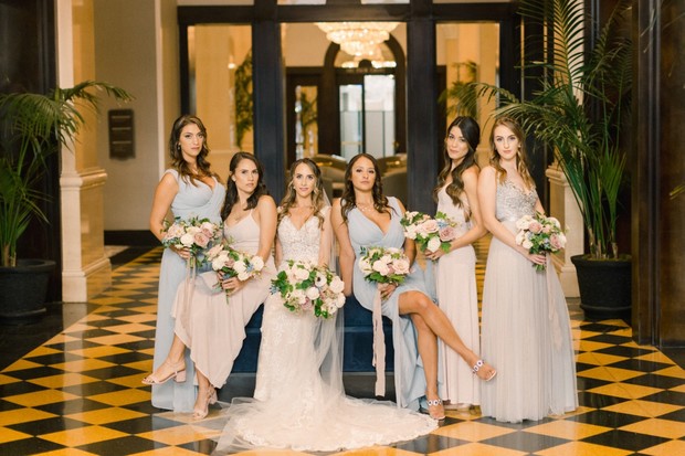 bridesmaids in mismatched blue and grey