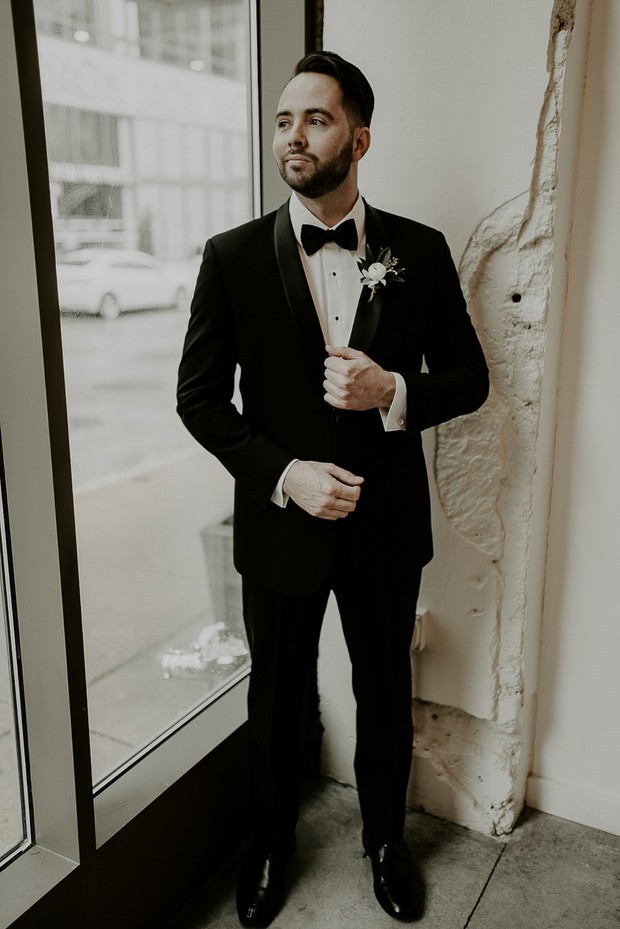 groom in classic wedding suit