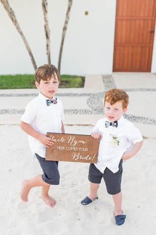 ring bearers and cute sign