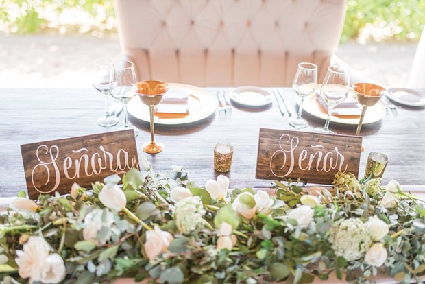Spanish bride and groom seat signs
