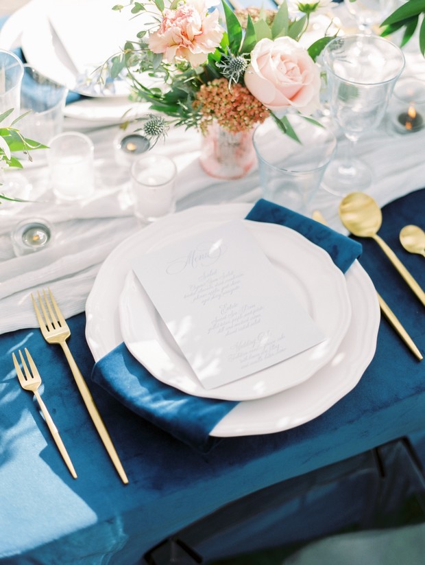 blue and gold wedding place setting