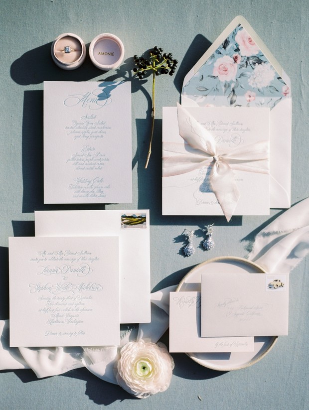 elegant blue and white embossed wedding invitation suite