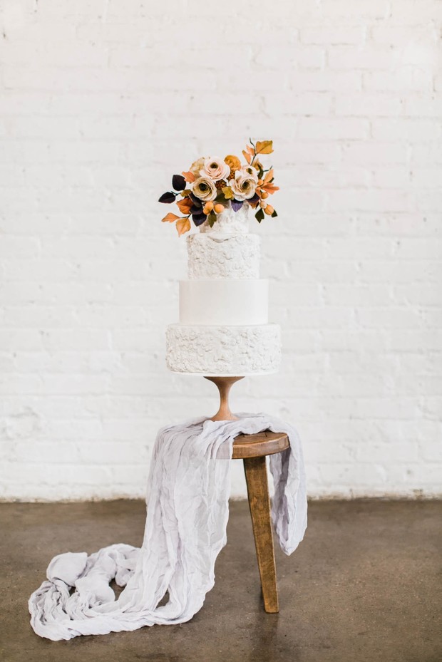 Flower topped wedding cake