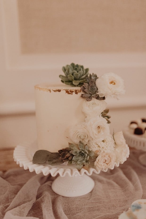 mini wedding cake with succulents