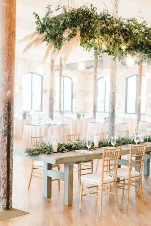 wedding table with greenery halo
