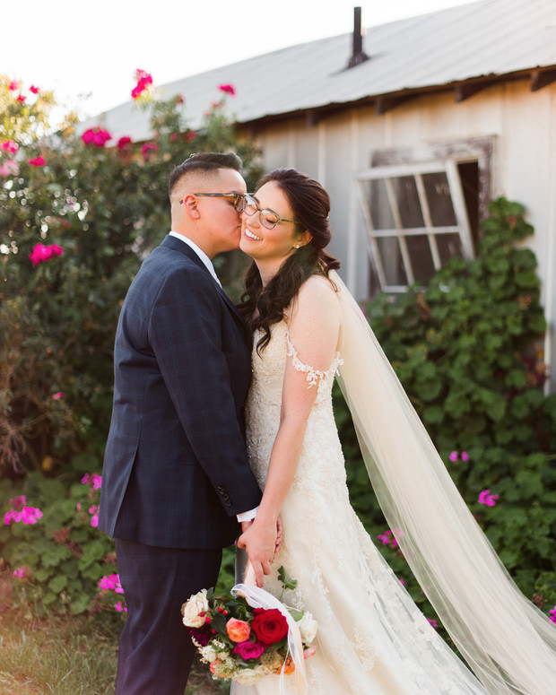Wedding photo of two happy brides on their special day