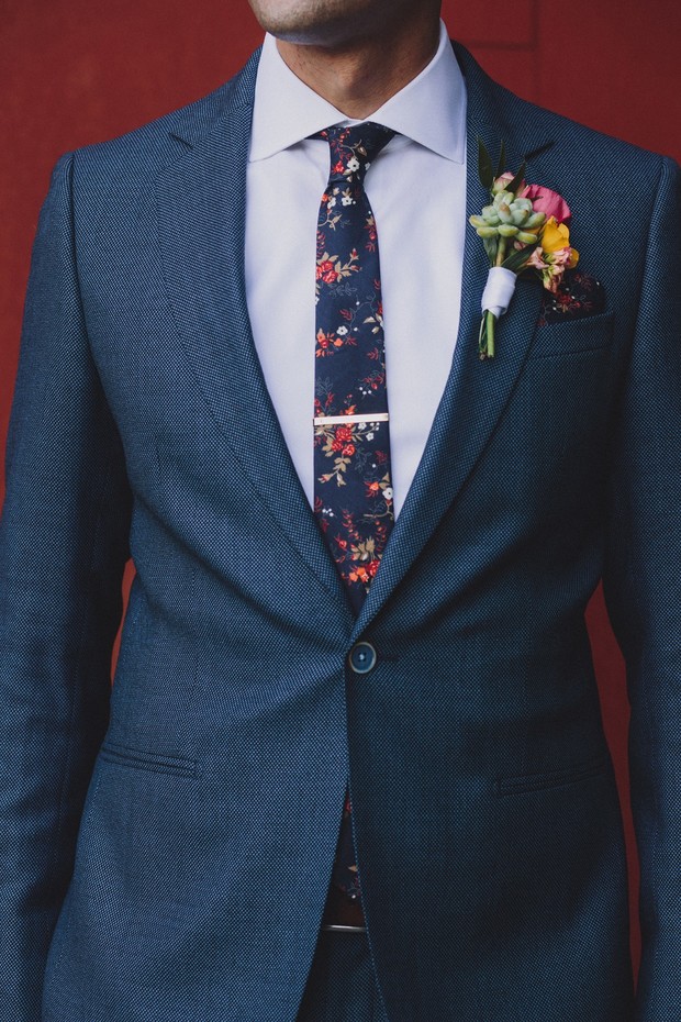floral accented groom style