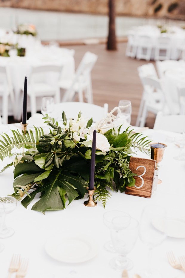 tropical greenery centerpiece for wedding
