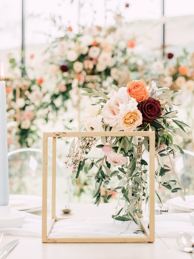 gold and floral wedding centerpiece