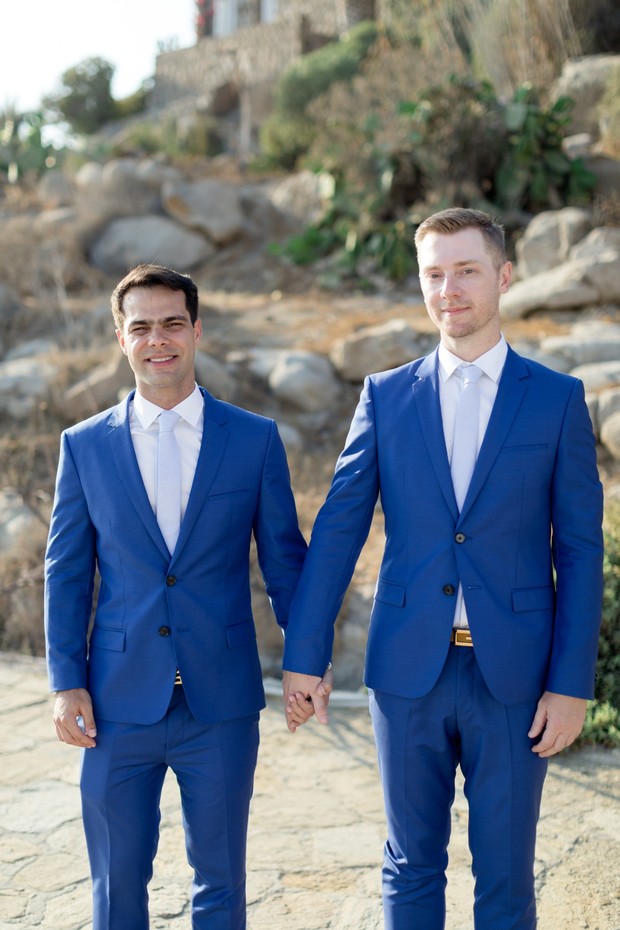grooms in blue suits