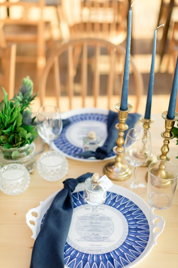 gold and blue wedding place setting