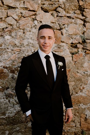 groom looking sharp in black tie