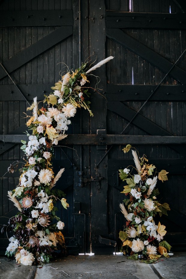 asymmetrical wedding flower backdrop