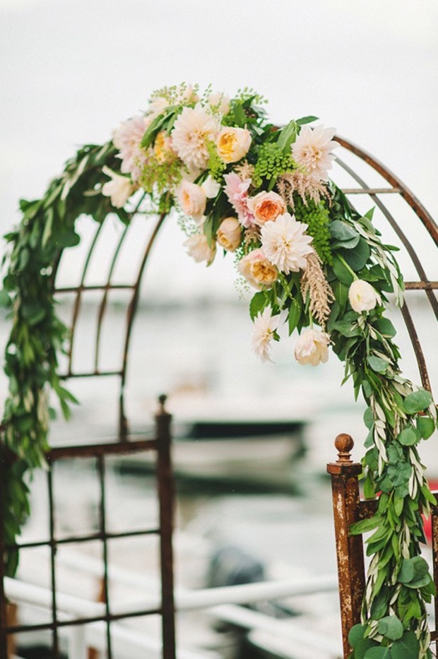 wedding floral arch in the rain