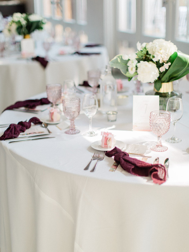 Elegant wedding table setting with flowers and details