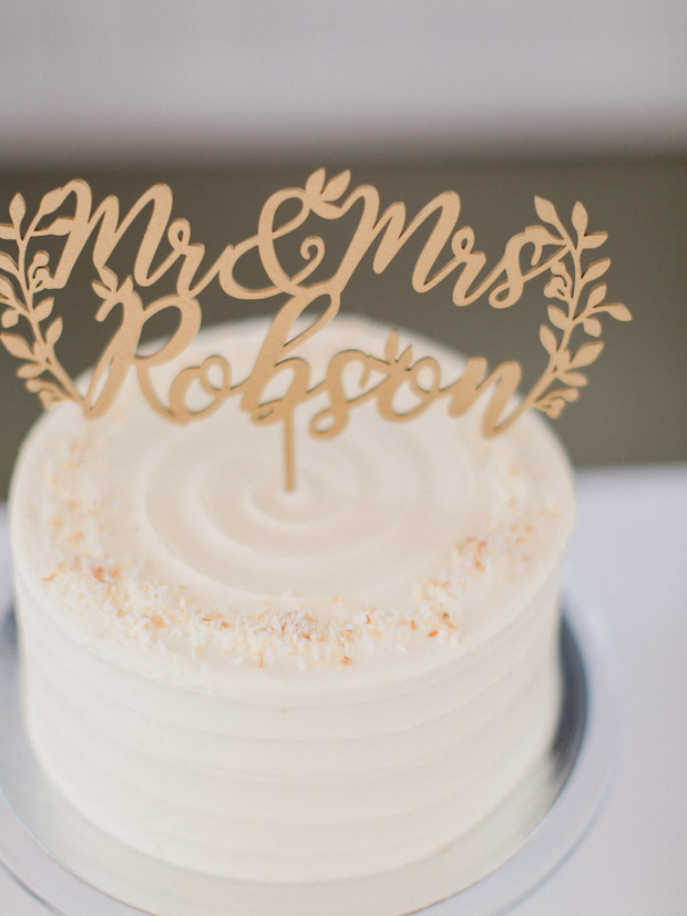Elegant wedding cake with a Mr & Mrs Robson topper