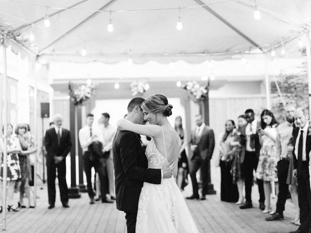 Bride and groom share a first dance at their wedding reception