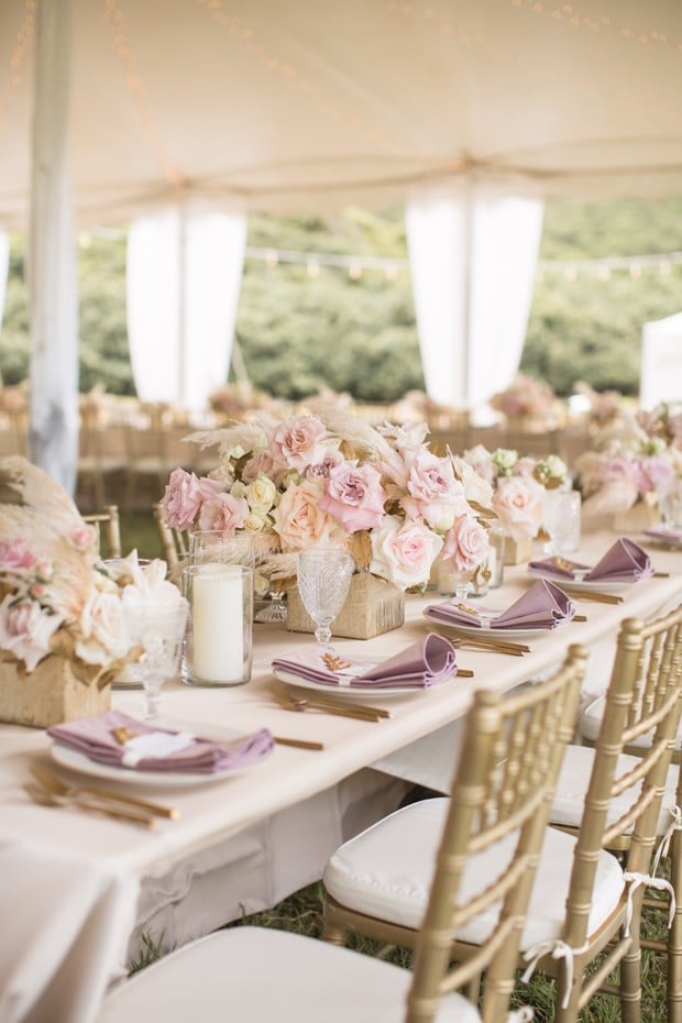 tented wedding reception in pink and gold